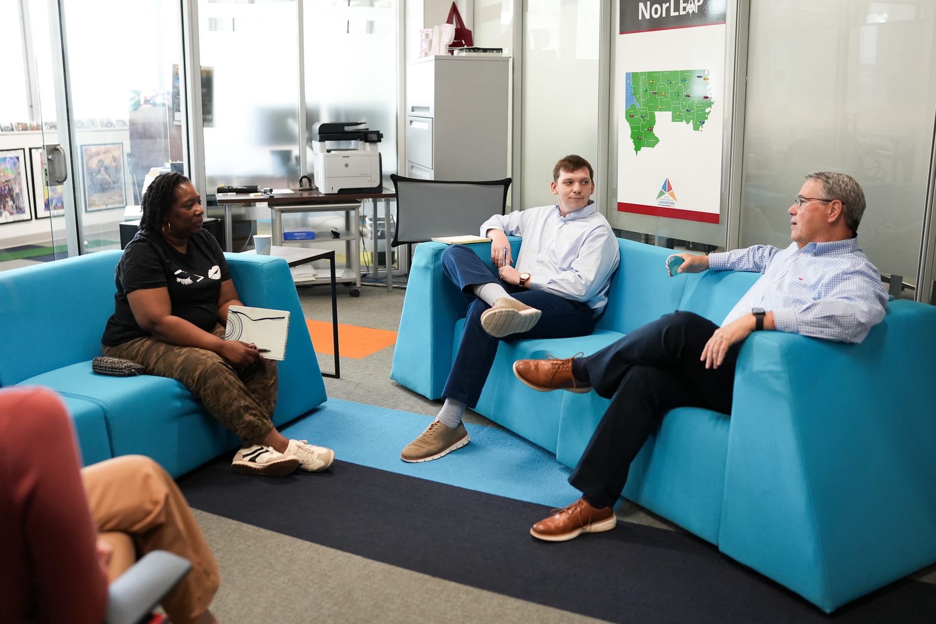 Casual office meeting discussion