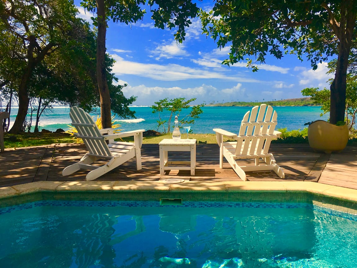 Petit Point Bungalow pool and deck overlooking Tobago lagoon